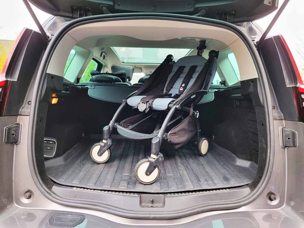 YOYO Babyzen stroller unfolded in the trunk of the car