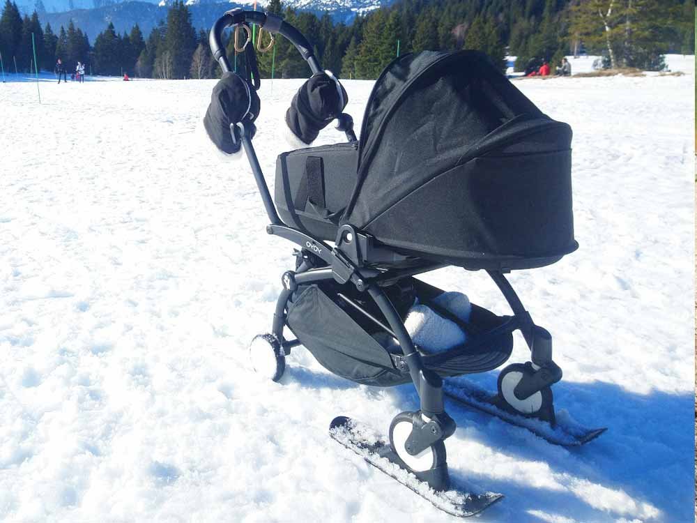 YOYO Babyzen stroller with skis on snow